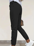 Women's black tailored slim-fit trousers